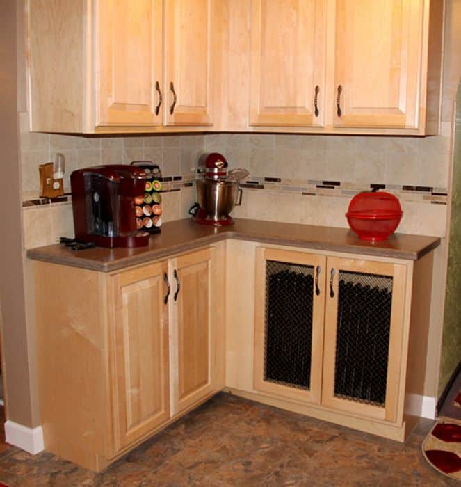 kitchen cabinet remodel with upper and lower oak cabinets